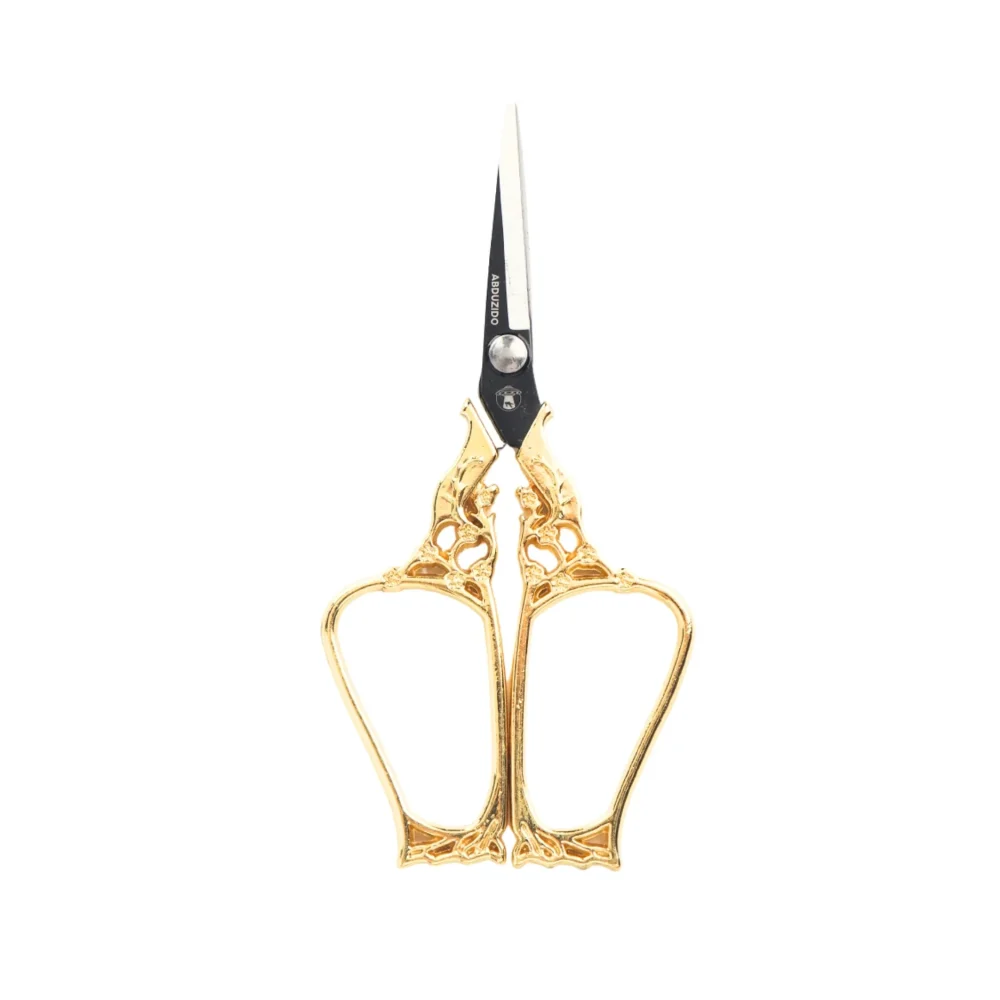 15329307085-15324490090-tesoura-abduzido-king-black-gold-34049.webp